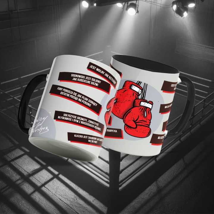 Biały kubek (330 ml) z cytatami Andrzeja Kostyra boks